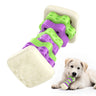 Purple and green corn shaped rubber dog chew toy with puppy biting